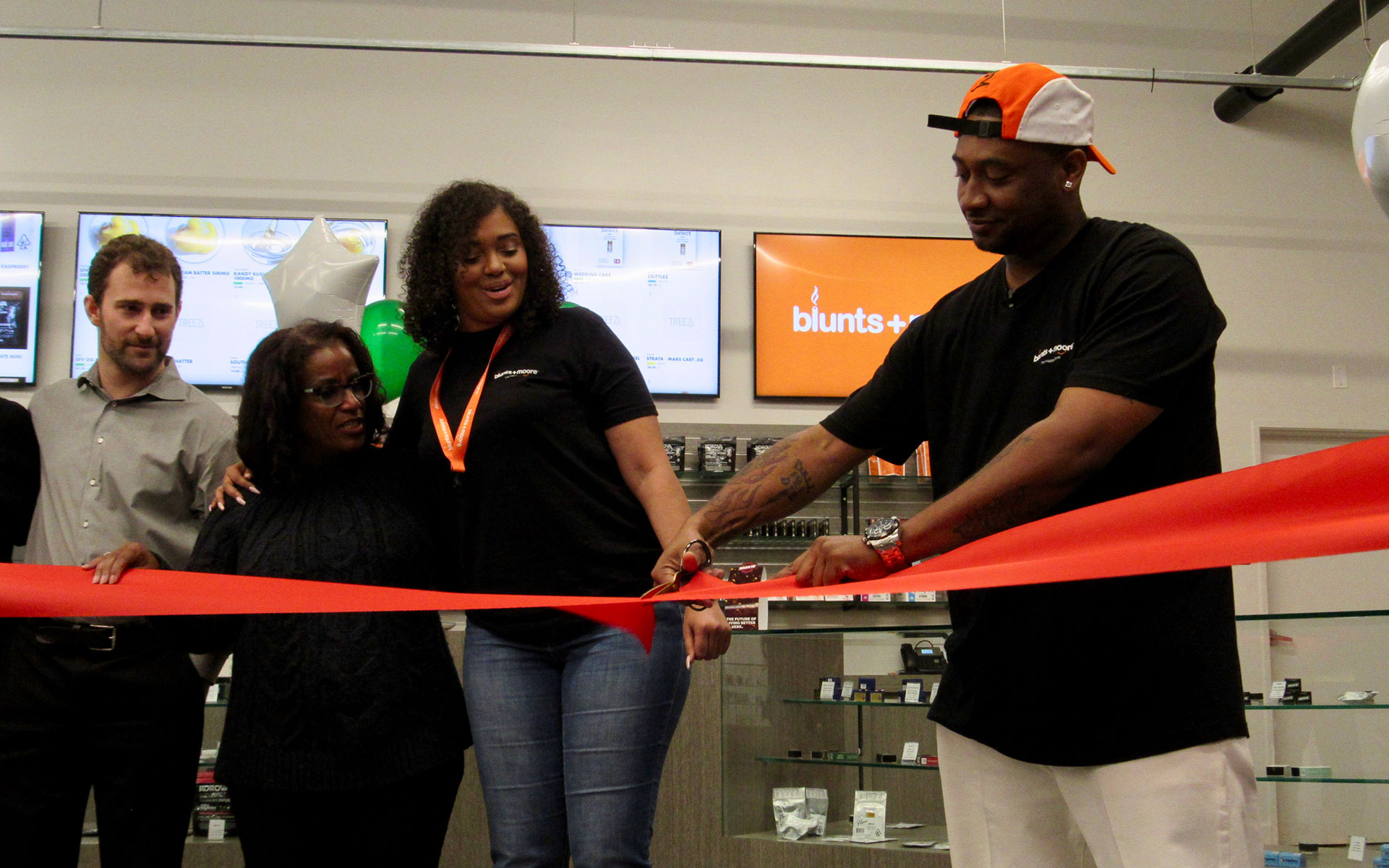 Dream Team: Oakland assistant to the city administrator Greg Minor, councilmember Desley Brooks, Brittany Moore, and Alphonso Blunt cut the ribbon Thursday.