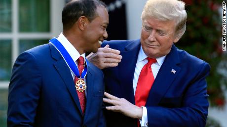 Trump awards Medal of Freedom to long-time friend Tiger Woods