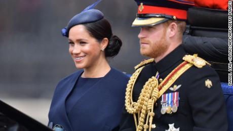 Meghan and Prince Harry make their way in a horse-drawn carriage to Horseguard&#39;s Parade ahead of Trooping the Colour.